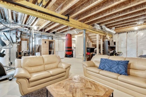 1714 Montgomery Gate Se, High River, AB - Indoor Photo Showing Basement