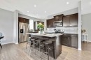 1714 Montgomery Gate Se, High River, AB  - Indoor Photo Showing Kitchen With Upgraded Kitchen 