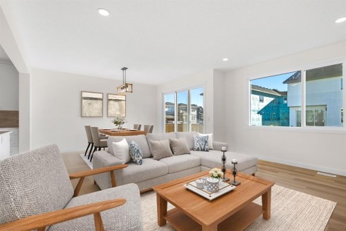 53 Versant Point Sw, Calgary, AB - Indoor Photo Showing Living Room