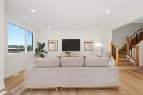 53 Versant Point Sw, Calgary, AB - Indoor Photo Showing Living Room