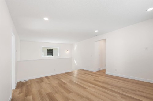 53 Versant Point Sw, Calgary, AB - Indoor Photo Showing Other Room