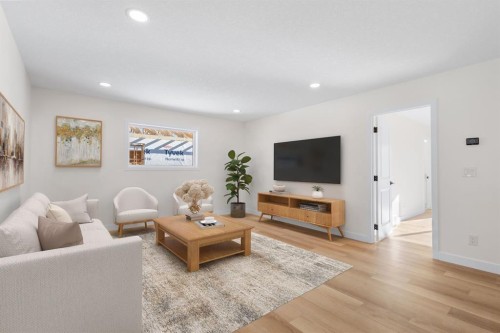53 Versant Point Sw, Calgary, AB - Indoor Photo Showing Living Room