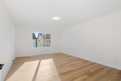 53 Versant Point Sw, Calgary, AB - Indoor Photo Showing Other Room