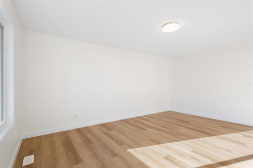 53 Versant Point Sw, Calgary, AB - Indoor Photo Showing Other Room