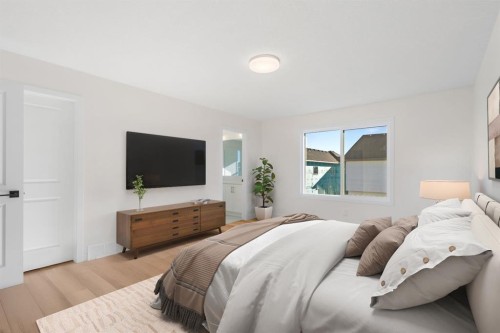 53 Versant Point Sw, Calgary, AB - Indoor Photo Showing Bedroom