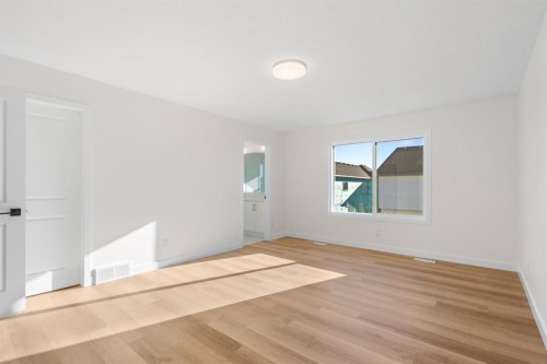53 Versant Point Sw, Calgary, AB - Indoor Photo Showing Other Room