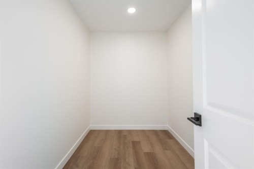 53 Versant Point Sw, Calgary, AB - Indoor Photo Showing Other Room