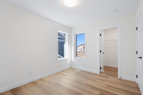 53 Versant Point Sw, Calgary, AB - Indoor Photo Showing Other Room