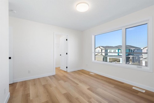 53 Versant Point Sw, Calgary, AB - Indoor Photo Showing Other Room