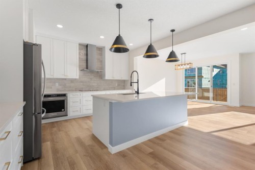 53 Versant Point Sw, Calgary, AB - Indoor Photo Showing Kitchen With Upgraded Kitchen
