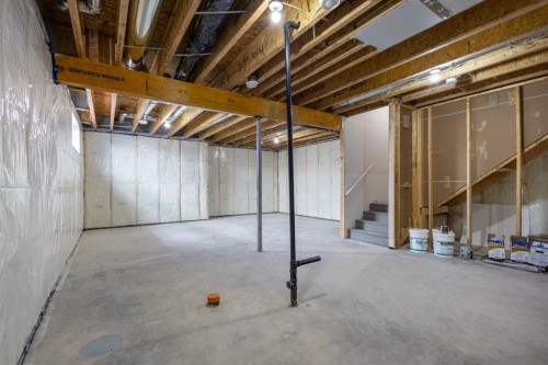 53 Versant Point Sw, Calgary, AB - Indoor Photo Showing Basement