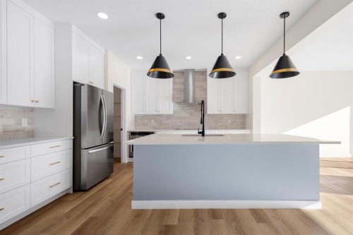 53 Versant Point Sw, Calgary, AB - Indoor Photo Showing Kitchen With Upgraded Kitchen