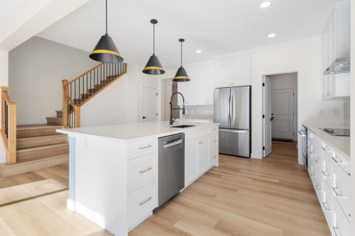 53 Versant Point Sw, Calgary, AB - Indoor Photo Showing Kitchen With Stainless Steel Kitchen With Upgraded Kitchen