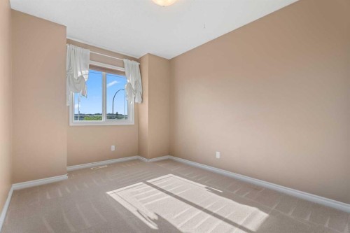 40 Cimarron Grove Drive, Okotoks, AB - Indoor Photo Showing Other Room