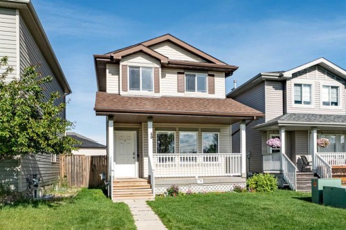 40 Cimarron Grove Drive, Okotoks, AB - Outdoor With Deck Patio Veranda With Facade