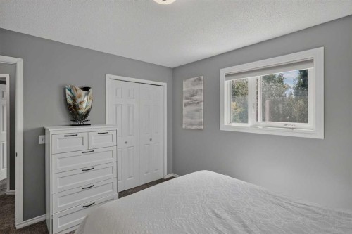 13 Coventry Way Ne, Calgary, AB - Indoor Photo Showing Bedroom