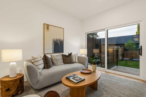 2-8916 33 Avenue Nw, Calgary, AB - Indoor Photo Showing Living Room