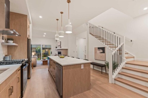 2-8916 33 Avenue Nw, Calgary, AB - Indoor Photo Showing Kitchen With Upgraded Kitchen