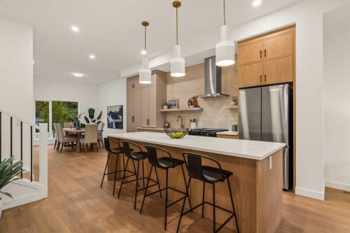 2-8916 33 Avenue Nw, Calgary, AB - Indoor Photo Showing Kitchen With Upgraded Kitchen
