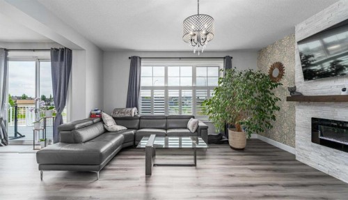 46 Yorkstone Way Sw, Calgary, AB - Indoor Photo Showing Living Room With Fireplace