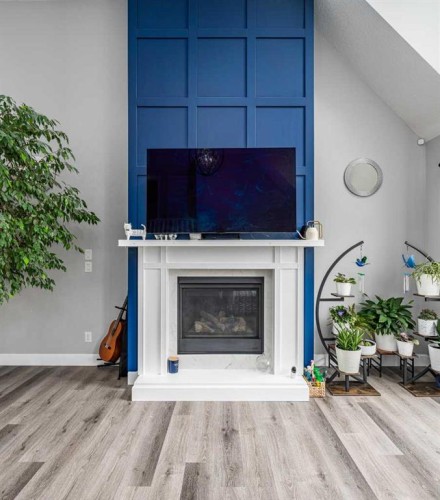 46 Yorkstone Way Sw, Calgary, AB - Indoor Photo Showing Living Room With Fireplace