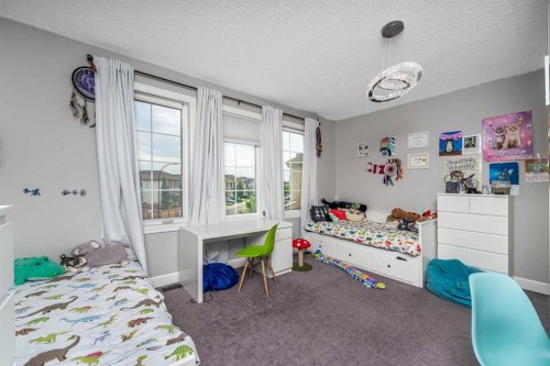 46 Yorkstone Way Sw, Calgary, AB - Indoor Photo Showing Bedroom