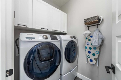 46 Yorkstone Way Sw, Calgary, AB - Indoor Photo Showing Laundry Room