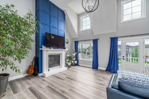46 Yorkstone Way Sw, Calgary, AB - Indoor With Fireplace
