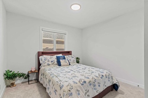 116 Ambleside Crescent Nw, Calgary, AB - Indoor Photo Showing Bedroom