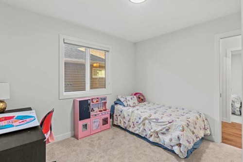 116 Ambleside Crescent Nw, Calgary, AB - Indoor Photo Showing Bedroom