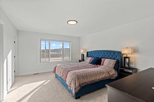 116 Ambleside Crescent Nw, Calgary, AB - Indoor Photo Showing Bedroom