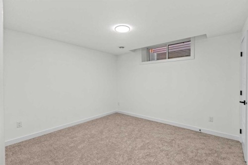 116 Ambleside Crescent Nw, Calgary, AB - Indoor Photo Showing Other Room