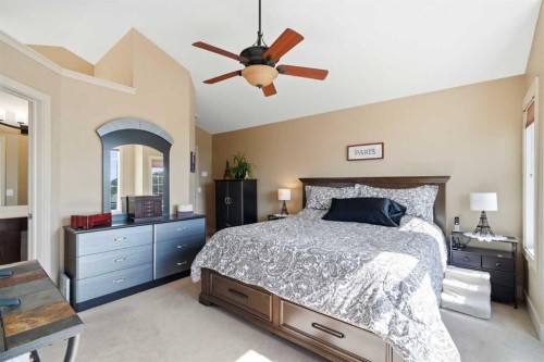 260 Willow Ridge Manor Sw, Diamond Valley, AB - Indoor Photo Showing Bedroom