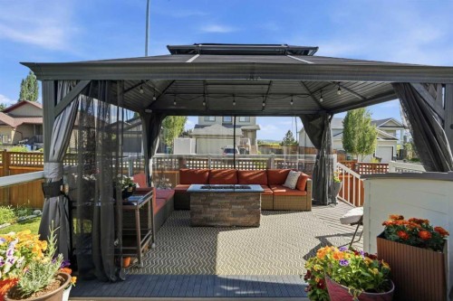 260 Willow Ridge Manor Sw, Diamond Valley, AB - Outdoor With Deck Patio Veranda With Exterior