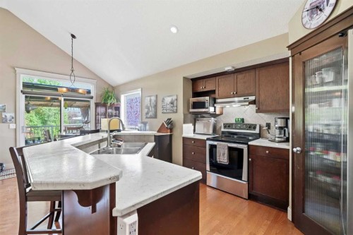 260 Willow Ridge Manor Sw, Diamond Valley, AB - Indoor Photo Showing Kitchen With Double Sink