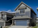 47 Sundown Crescent, Cochrane, AB  - Outdoor With Facade 