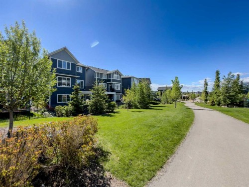 47 Sundown Crescent, Cochrane, AB - Outdoor With Facade