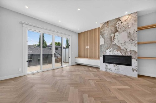 924 33A Street Nw, Calgary, AB - Indoor With Fireplace