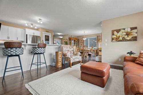 241 Sunset Heights, Cochrane, AB - Indoor Photo Showing Living Room