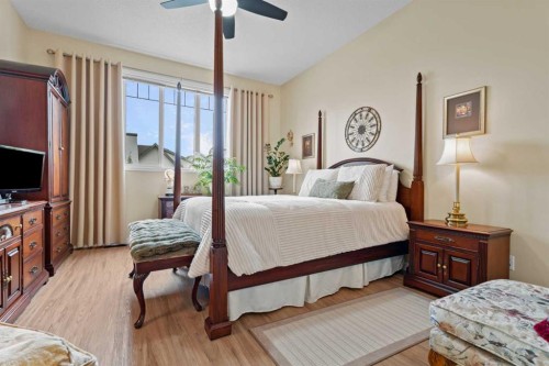 241 Sunset Heights, Cochrane, AB - Indoor Photo Showing Bedroom