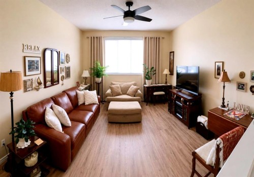 241 Sunset Heights, Cochrane, AB - Indoor Photo Showing Living Room