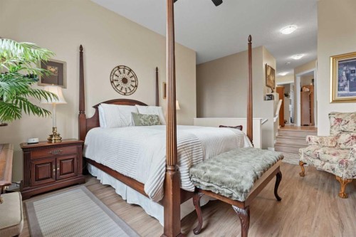 241 Sunset Heights, Cochrane, AB - Indoor Photo Showing Bedroom