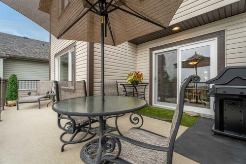 241 Sunset Heights, Cochrane, AB - Outdoor With Deck Patio Veranda With Exterior