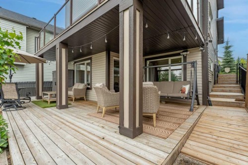 241 Sunset Heights, Cochrane, AB - Outdoor With Deck Patio Veranda With Exterior