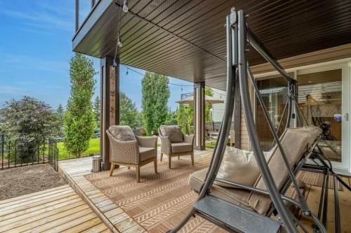 241 Sunset Heights, Cochrane, AB - Outdoor With Deck Patio Veranda With Exterior