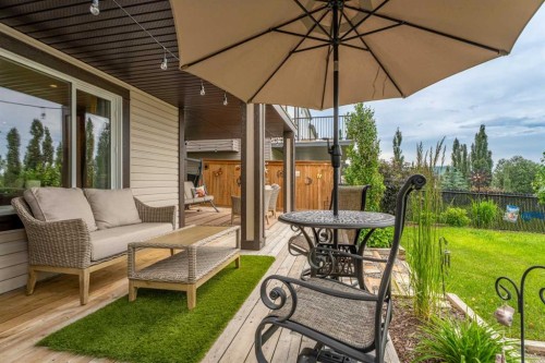 241 Sunset Heights, Cochrane, AB - Outdoor With Deck Patio Veranda With Exterior
