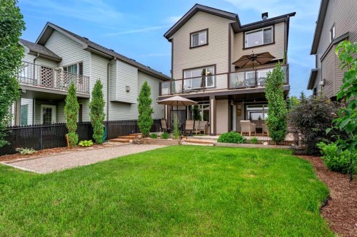 241 Sunset Heights, Cochrane, AB - Outdoor With Deck Patio Veranda