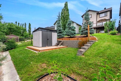241 Sunset Heights, Cochrane, AB - Outdoor With Deck Patio Veranda