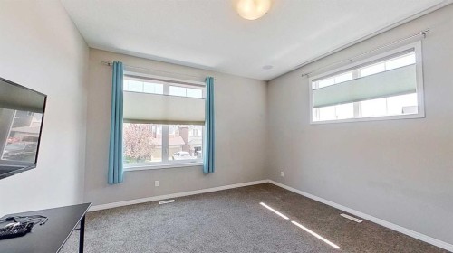 39 Sunrise View, Cochrane, AB - Indoor Photo Showing Other Room
