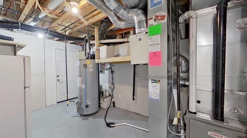 39 Sunrise View, Cochrane, AB - Indoor Photo Showing Basement